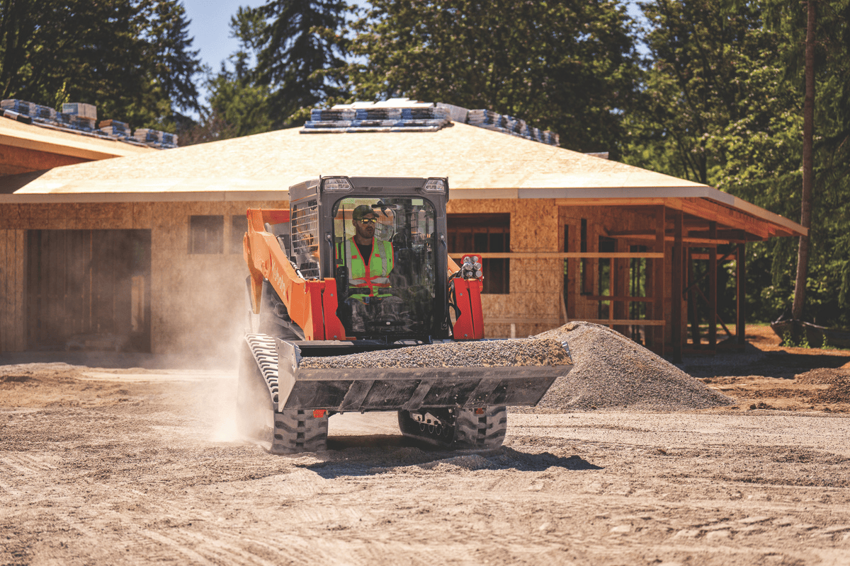 svl75-3 hauling gravel on site